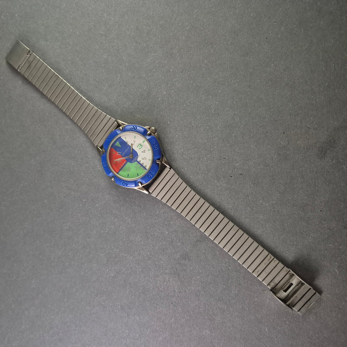 Seltene Qemeux Herrenarmbanduhr – Buntes Design mit Edelstahlarmband