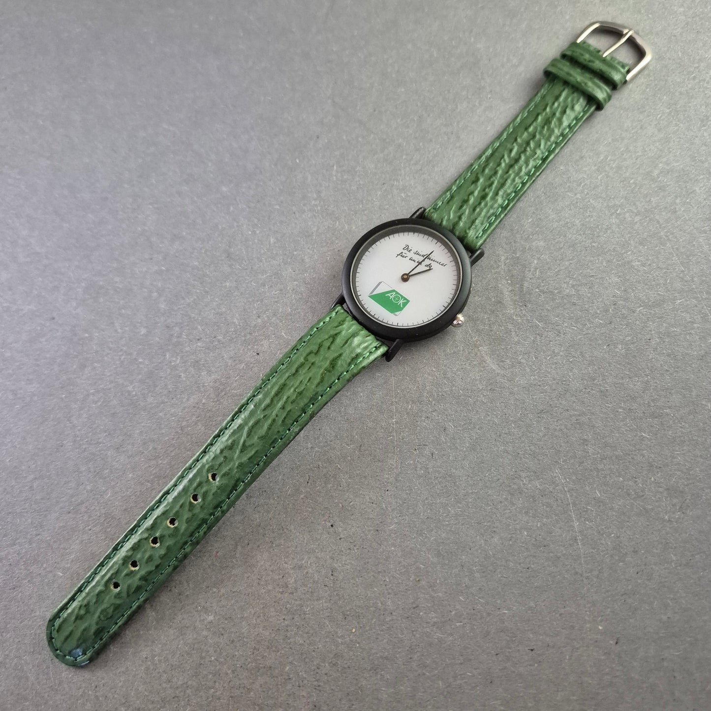 Seltene AOK Quarz Uhr – Werbeuhr mit grünem Lederarmband