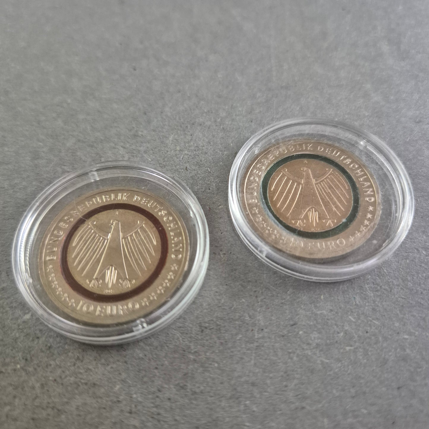 2x 10-Euro-Gedenkmünzen mit Polymer-Ring – Feuerwehr & Pflege