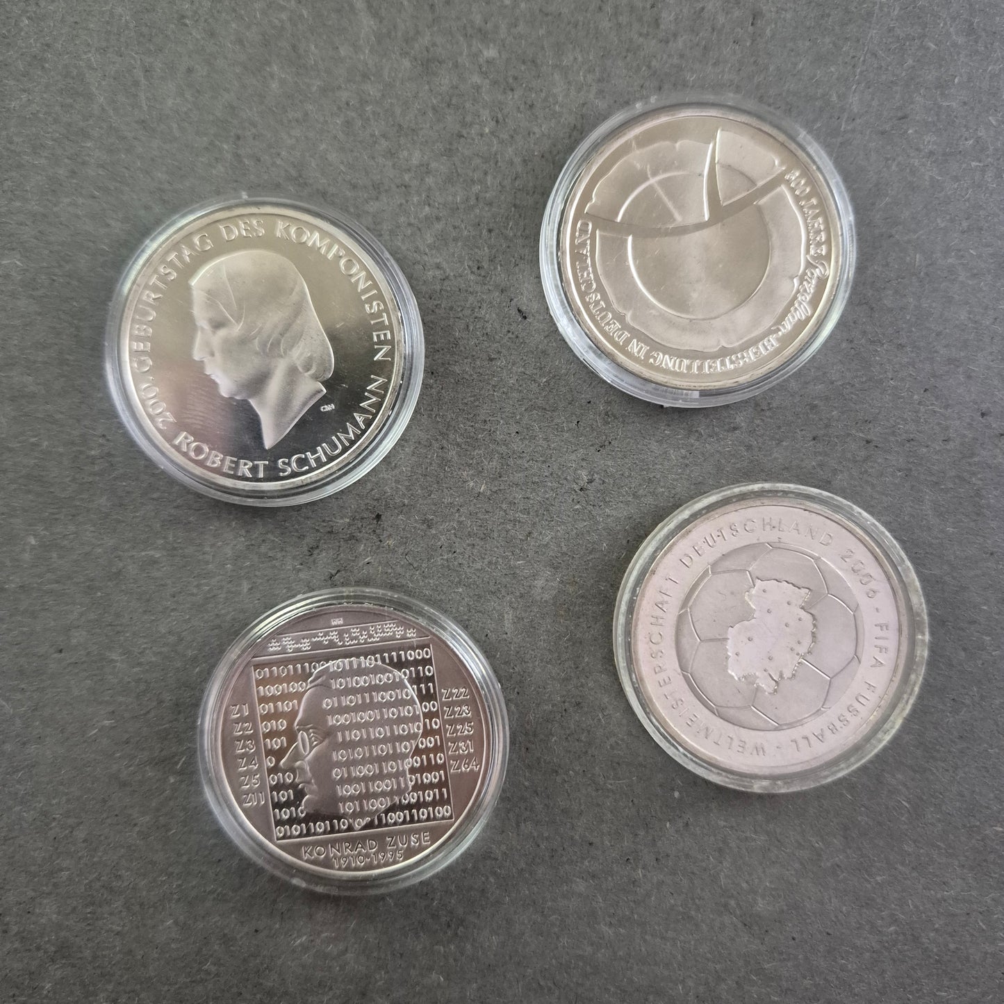 4x 10-Euro-Gedenkmünzen Deutschland – Schumann, Zuse, Raumfahrt & WM 2006