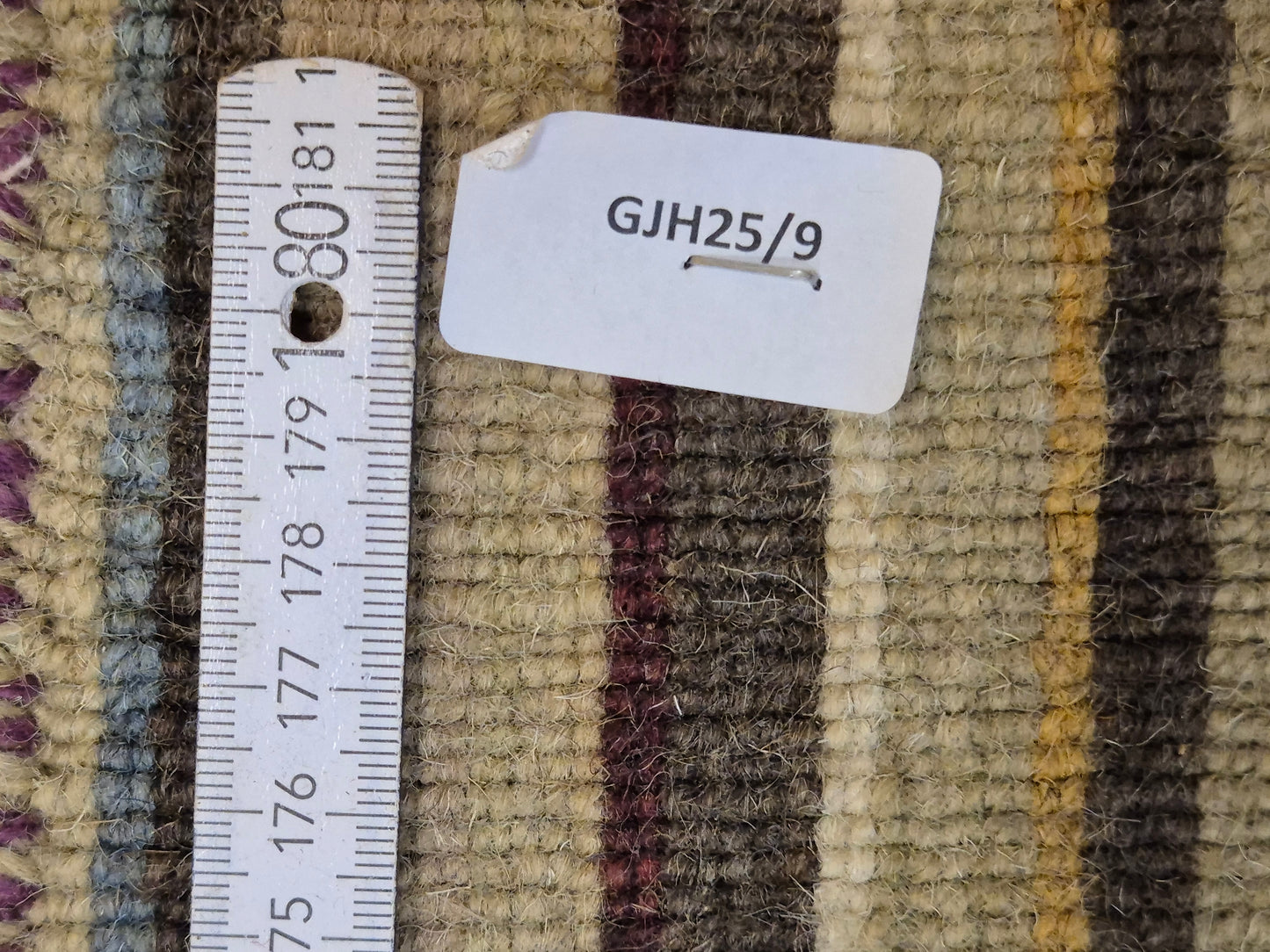 Perser Gabbeh Teppich Schurwolle Streifenmuster erdige Farbpalette