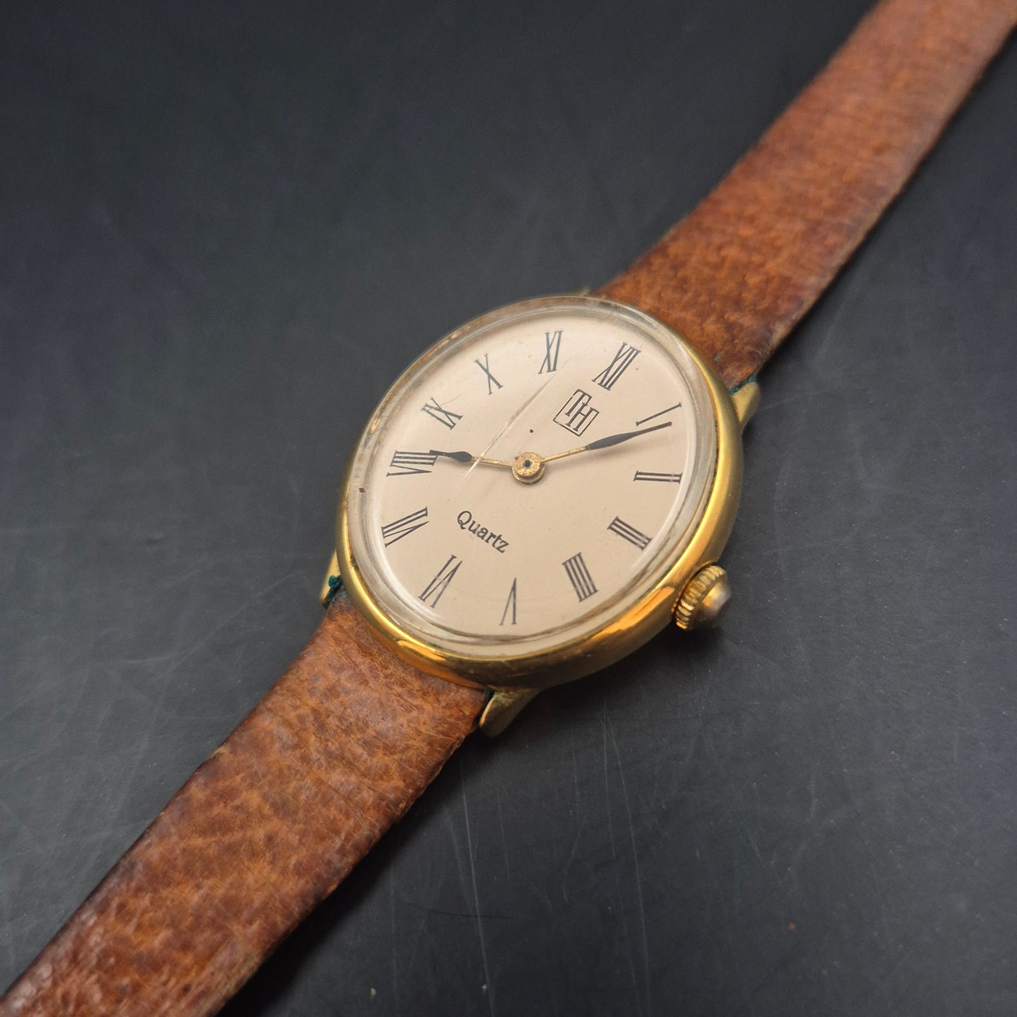 LH Damen Uhr – Quarz, Goldfarben mit römischen Ziffern