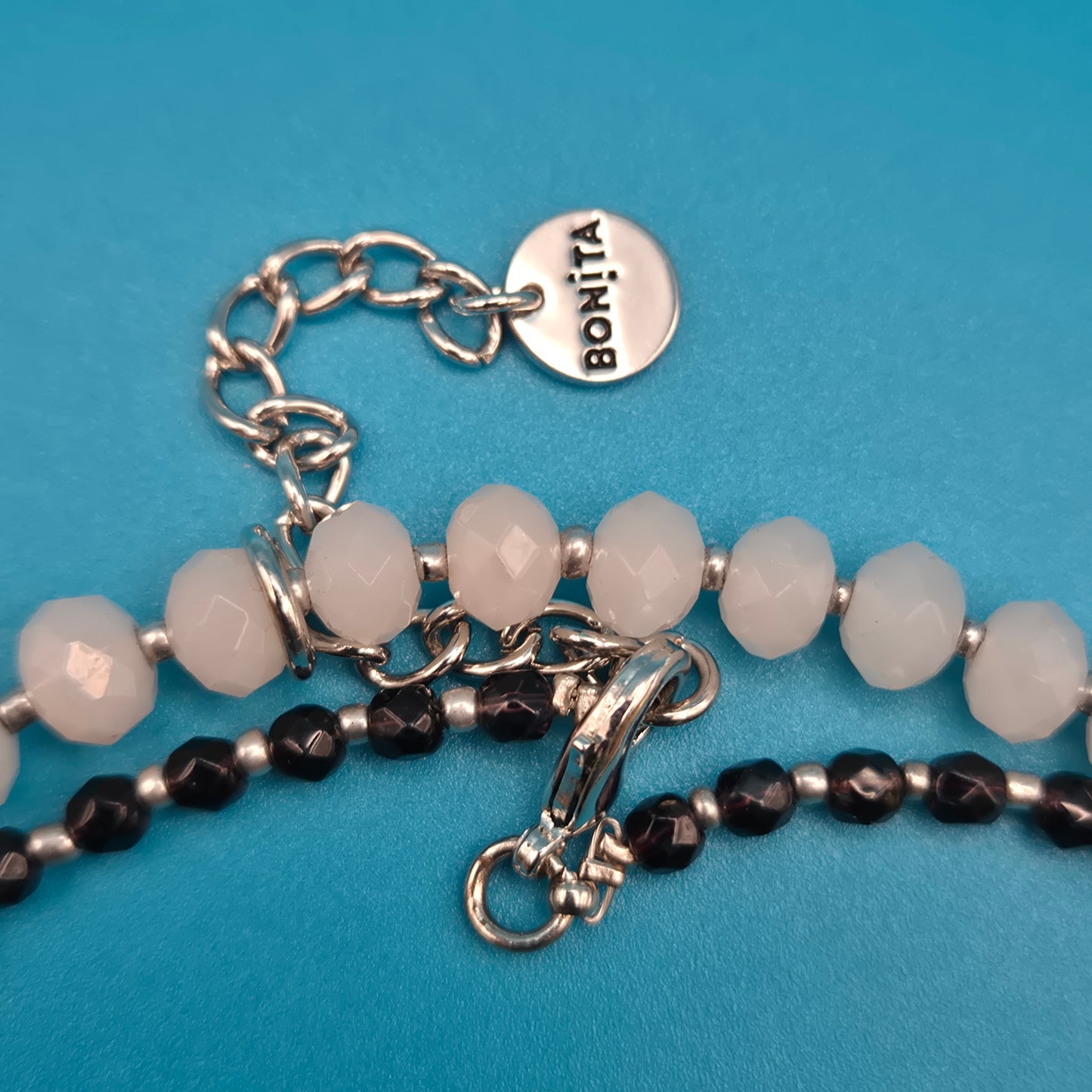 Elegante Bonita Designer-Kette mit facettierten Perlen in Rosé und Schwarz