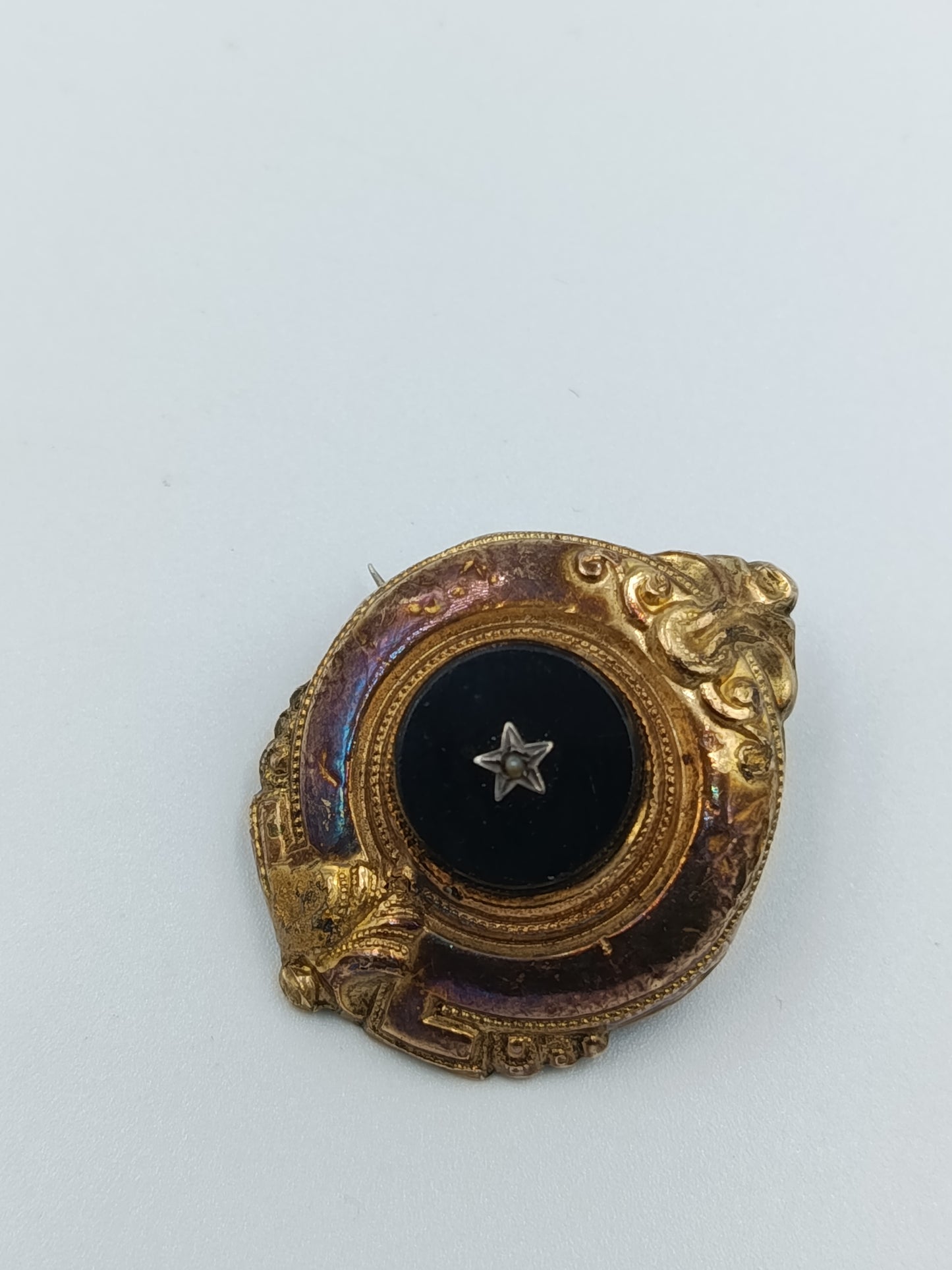 Antike Brosche mit schwarzem Onyx und Perlenstern