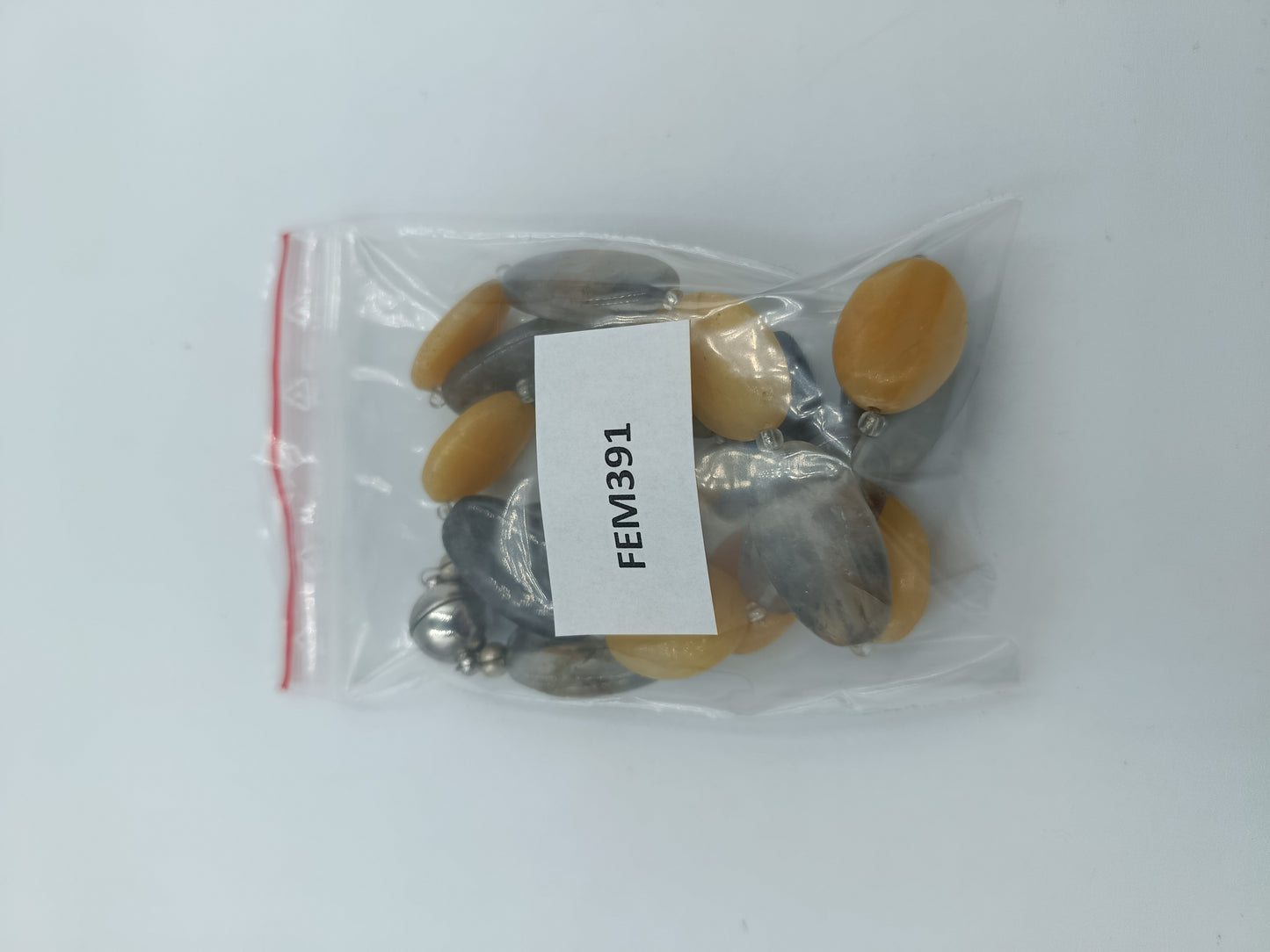 Elegante Halskette mit gelben und grauen Schmucksteinen