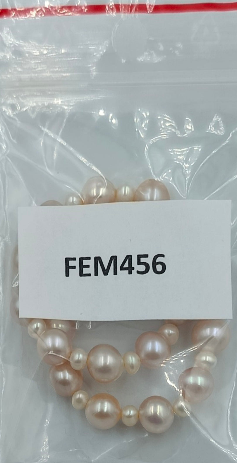 Perlenarmband in zarten Rosé- und Cremetönen