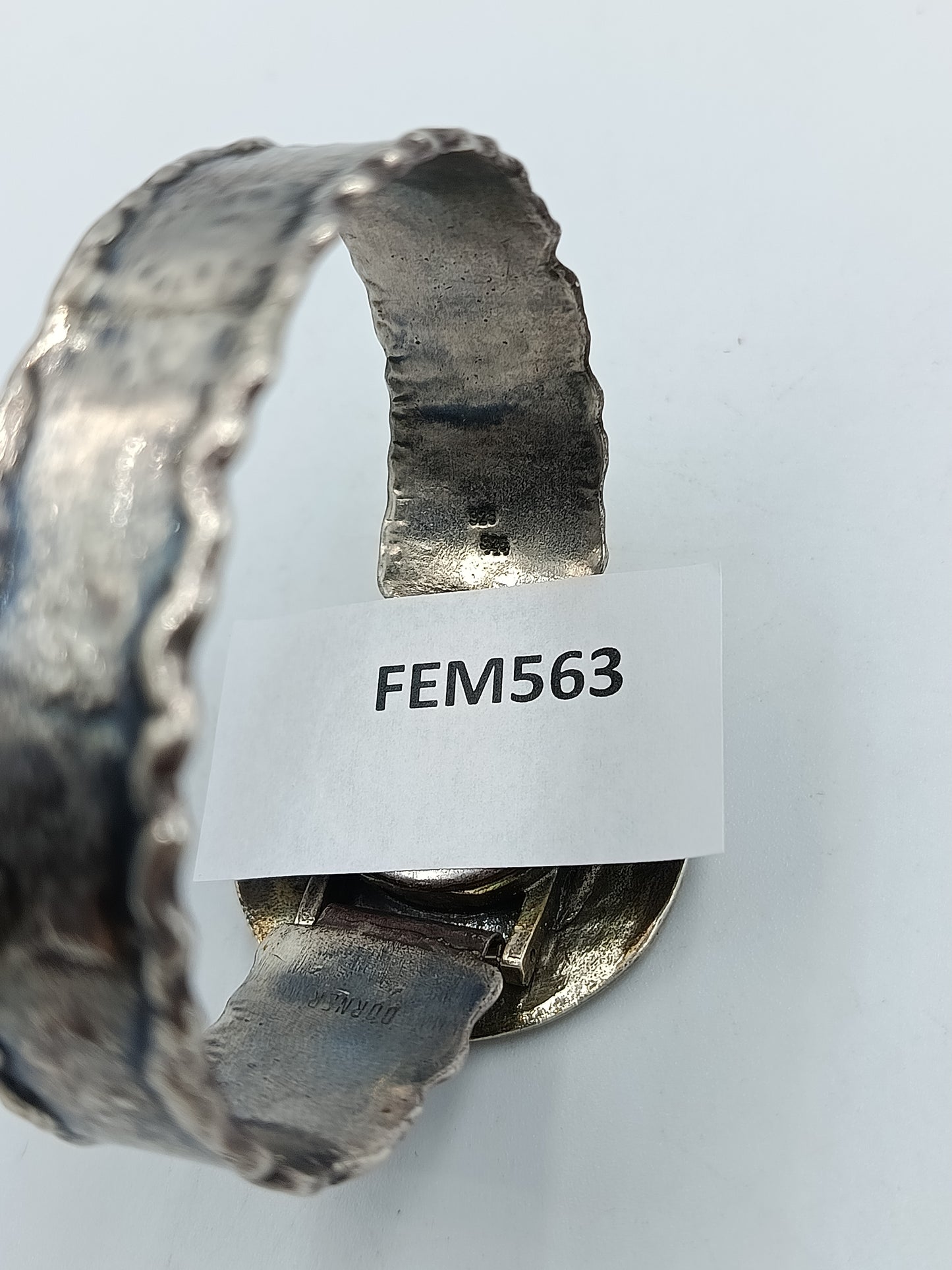 Handgearbeitete 835er Silberuhr mit Gold-Akzent