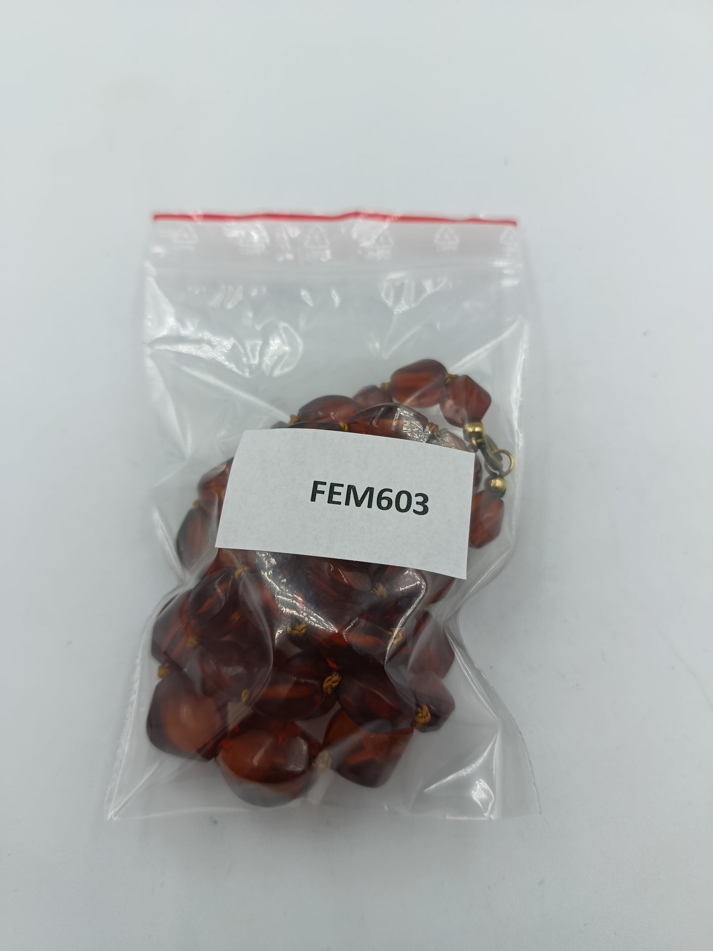 Bernsteinfarbene Perlenkette mit Goldakzenten