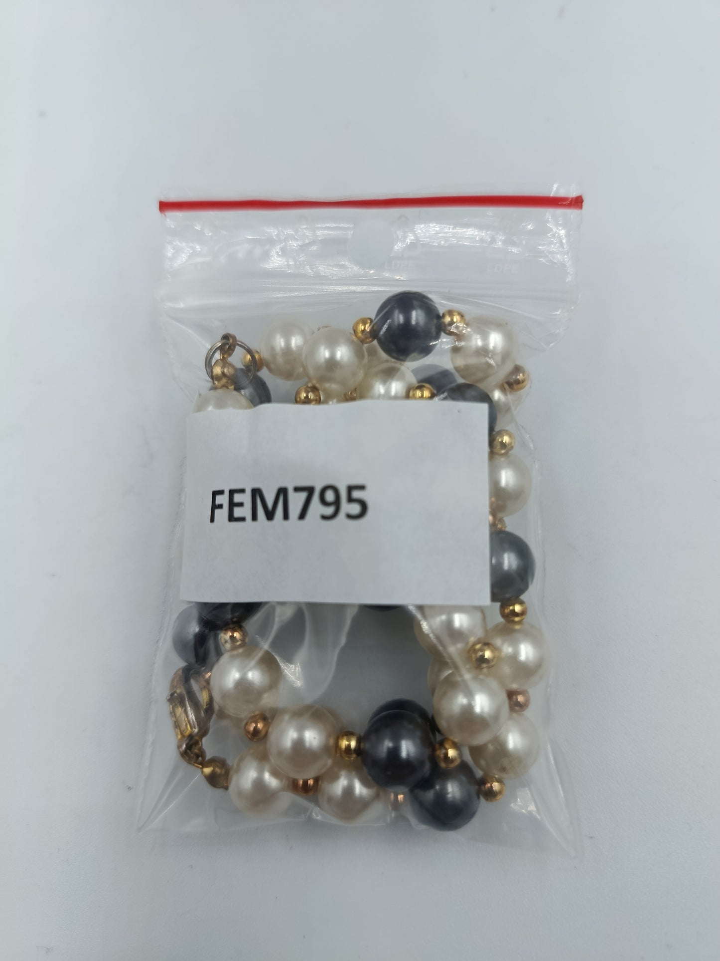 Zweifarbige Perlenkette mit goldfarbenen Akzenten