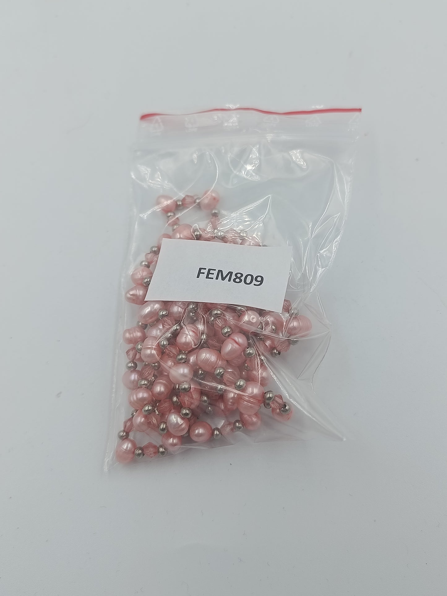 Rosa Perlenkette mit Glasperlen und silberfarbenen Zwischenelementen