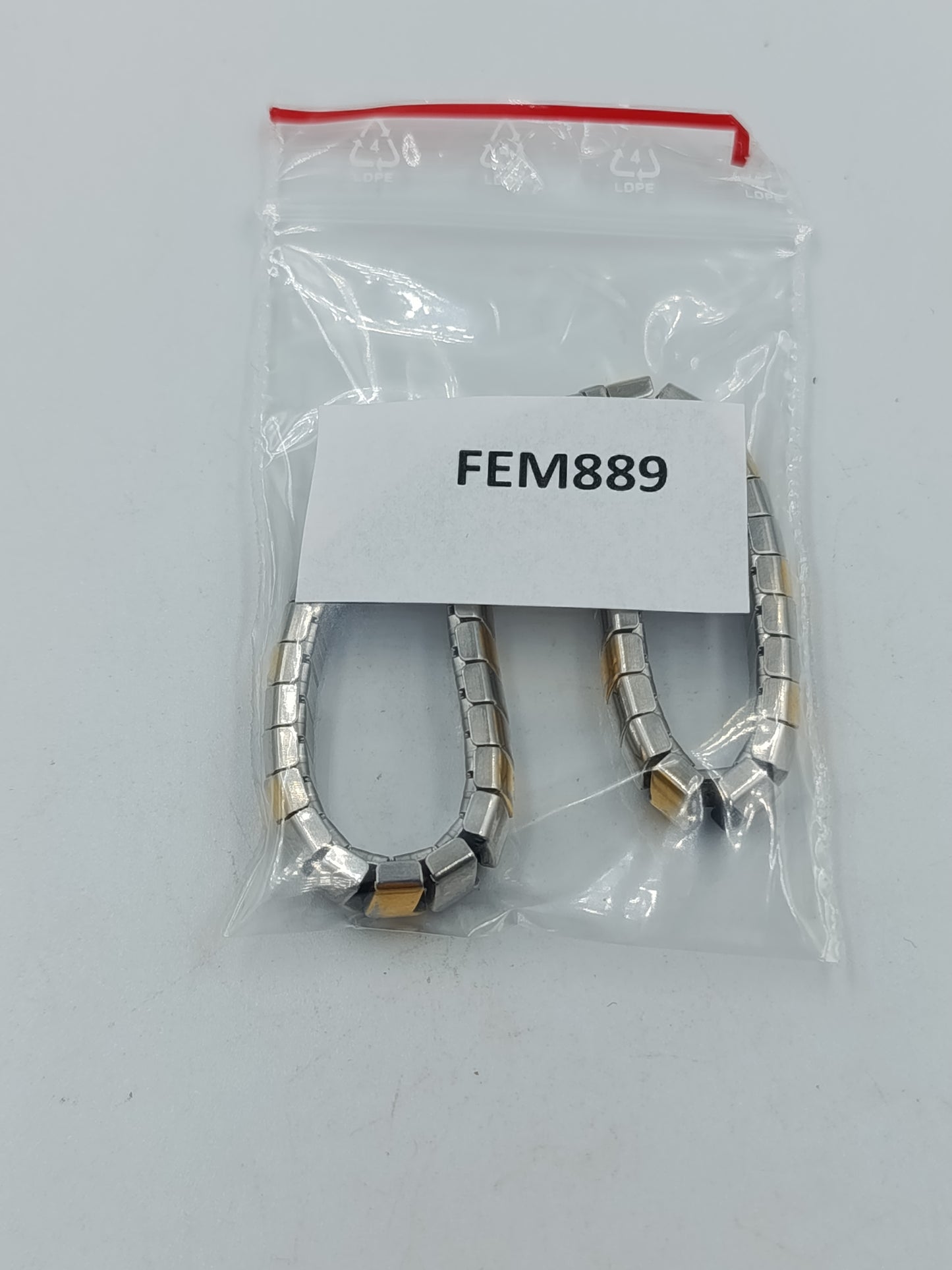 Zweifarbiges elastisches Armband in Silber und Goldoptik