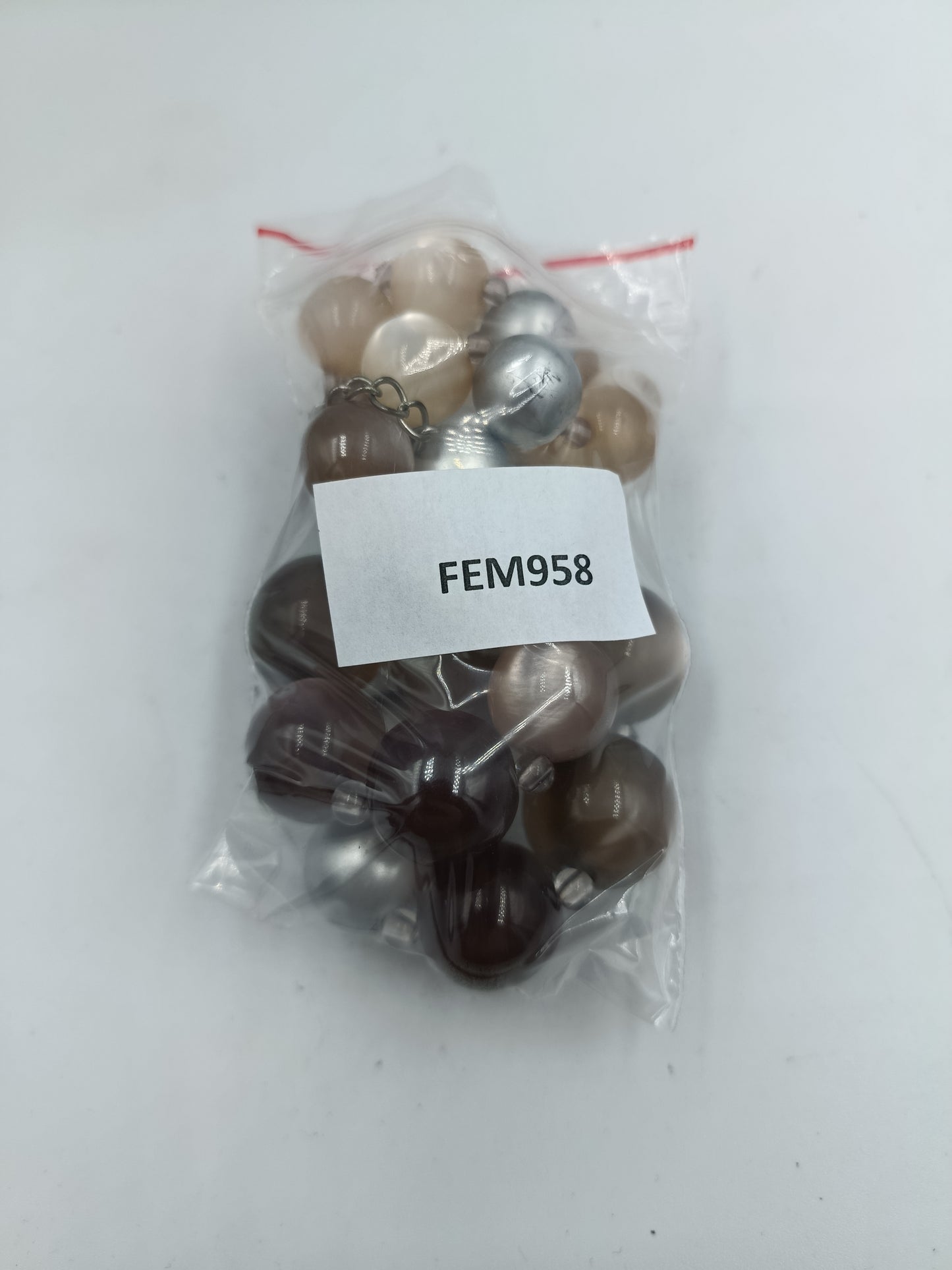 Halskette mit großen Kugelperlen in Braun und Silber Glanzeffekt