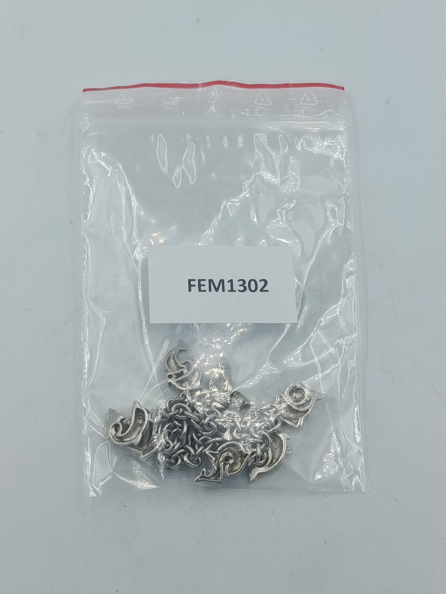 Silbernes Charm Armband aus 925 Silber mit Delfin Motiven und verspieltem Design