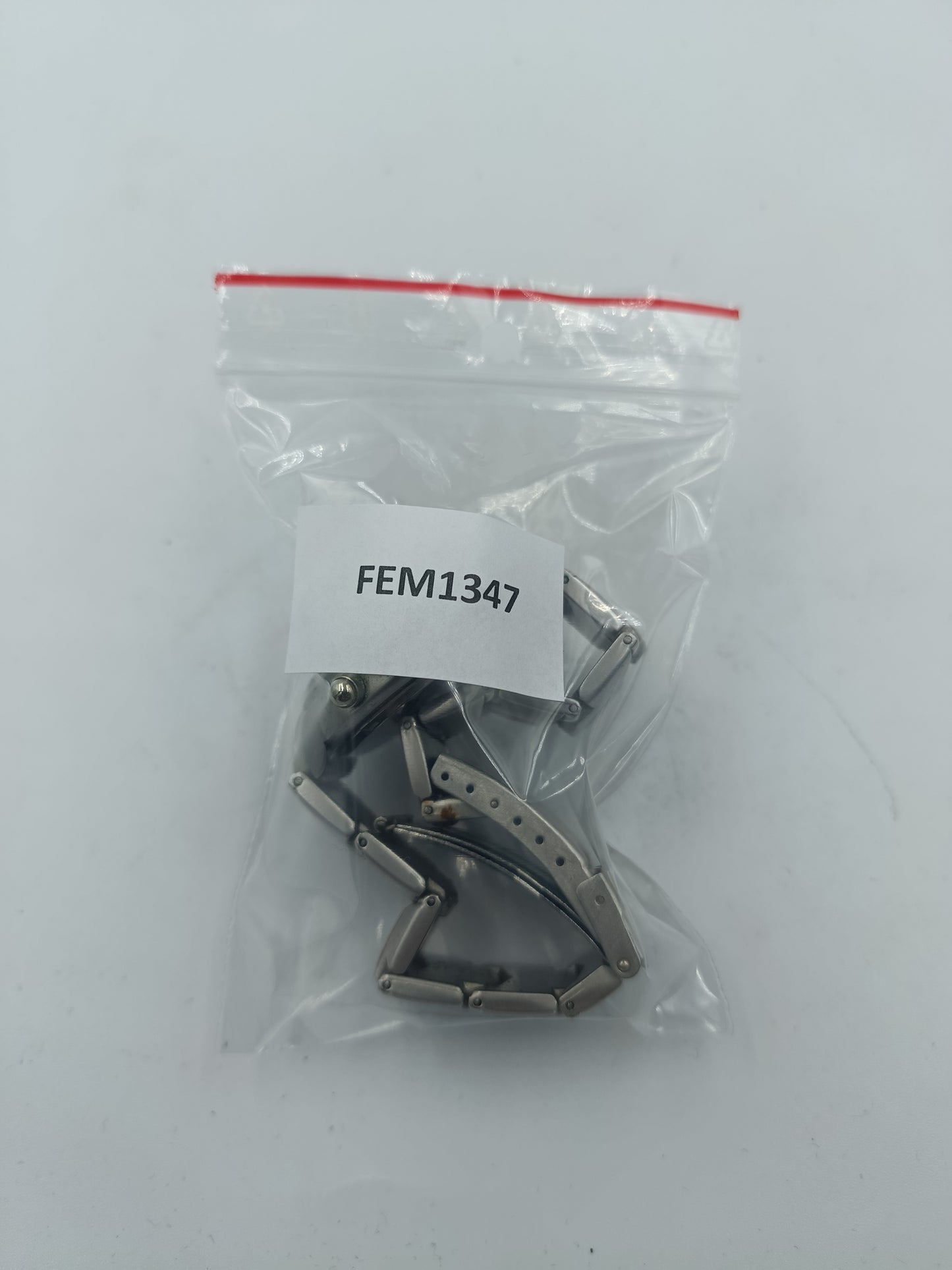 Geneva Armbanduhr mit blauem Zifferblatt und massivem Metallarmband im klassischen Stil