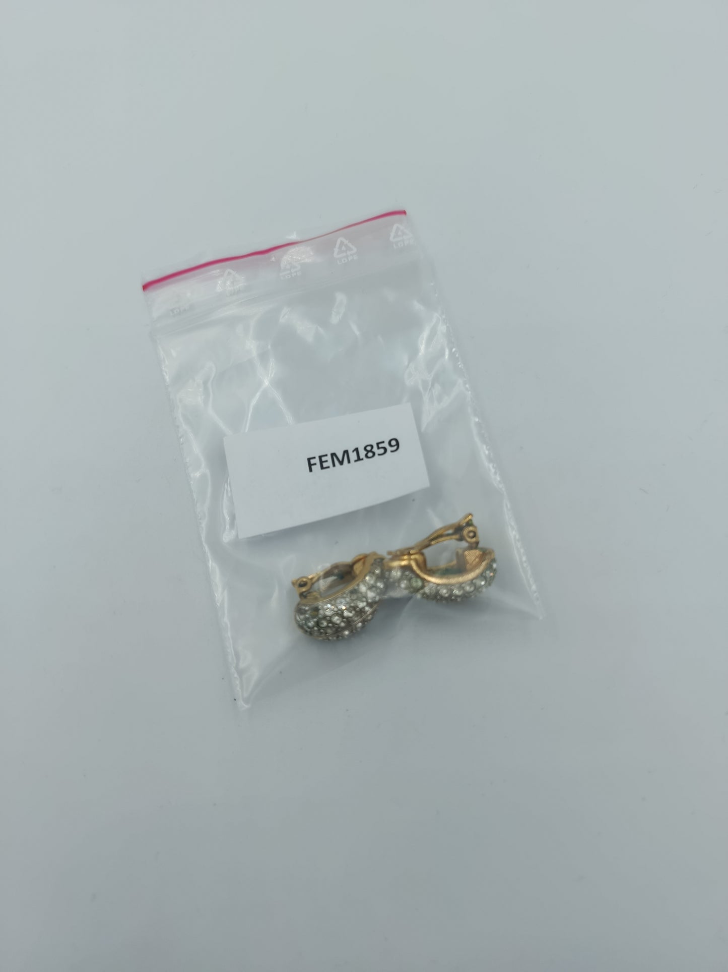 Vintage Ohrclips in Goldoptik mit funkelnden Strasssteinen Swarovski