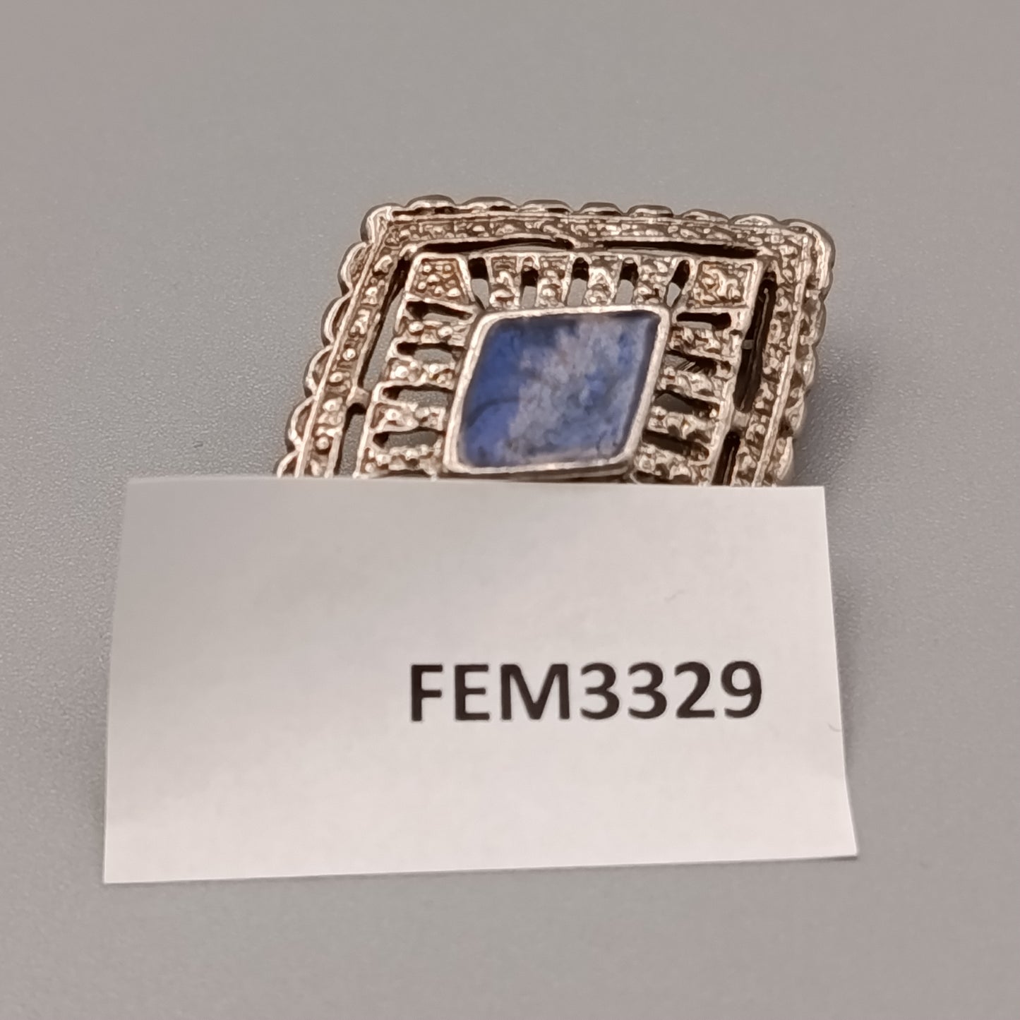 Klassische Art Déco Brosche mit blauem Emaille-Inlay