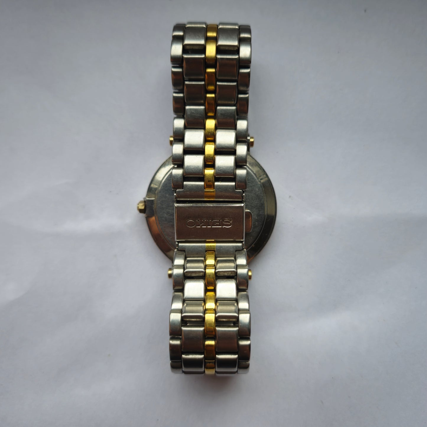 Seiko Herrenarmbanduhr mit Edelstahl-Gold-Look