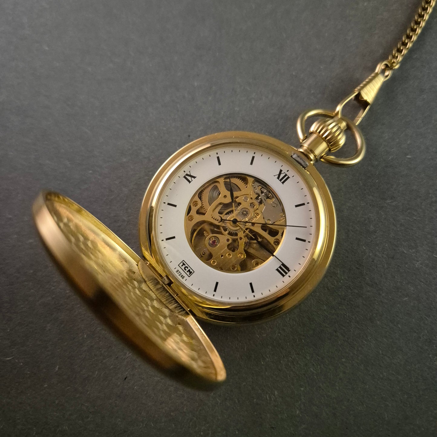 TCM Taschenuhr – Eleganter Skelettmechanismus mit Vergoldung