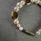 Elegantes Perlenarmband mit Bernsteinakzenten – Stilvoll und zeitlos