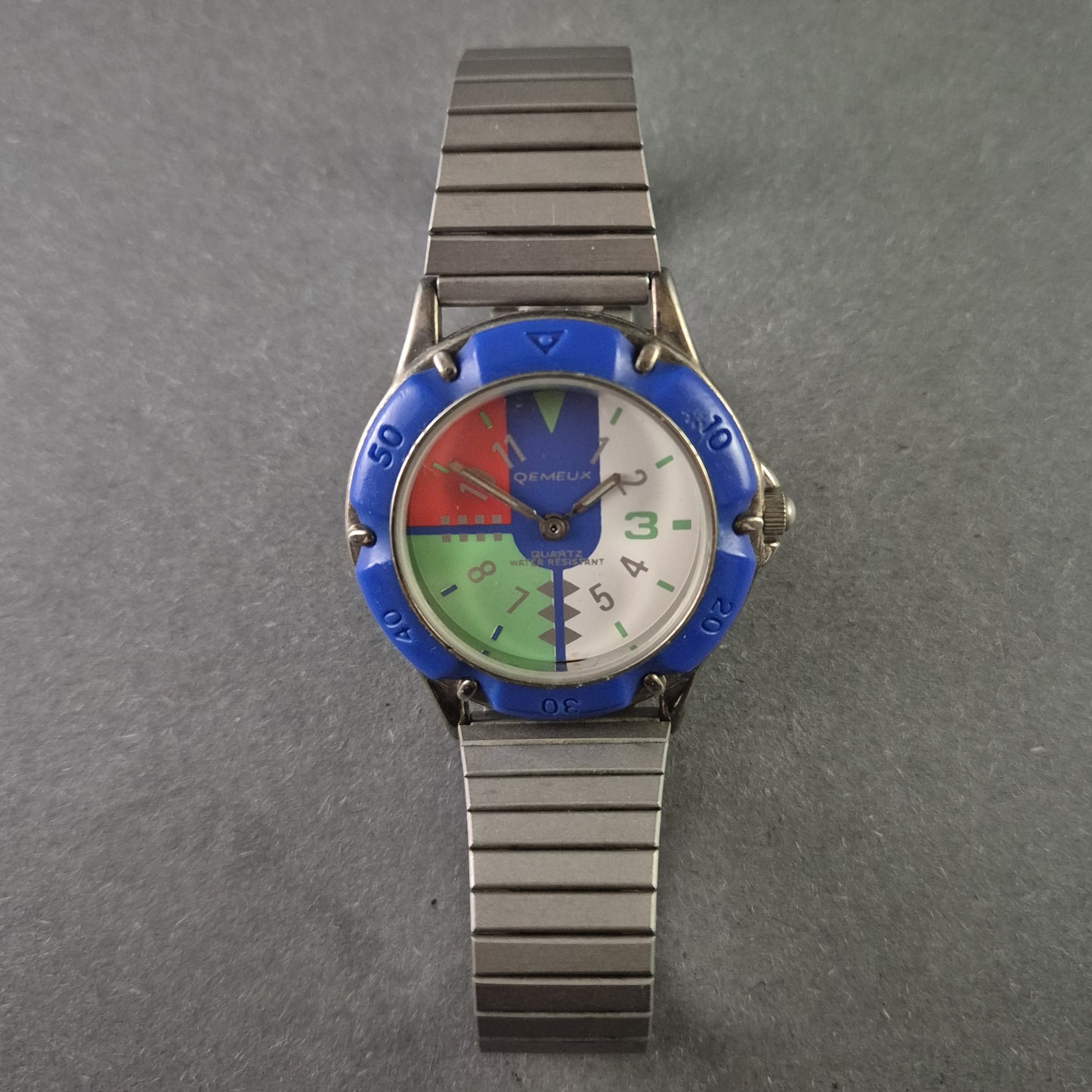 Seltene Qemeux Herrenarmbanduhr – Buntes Design mit Edelstahlarmband