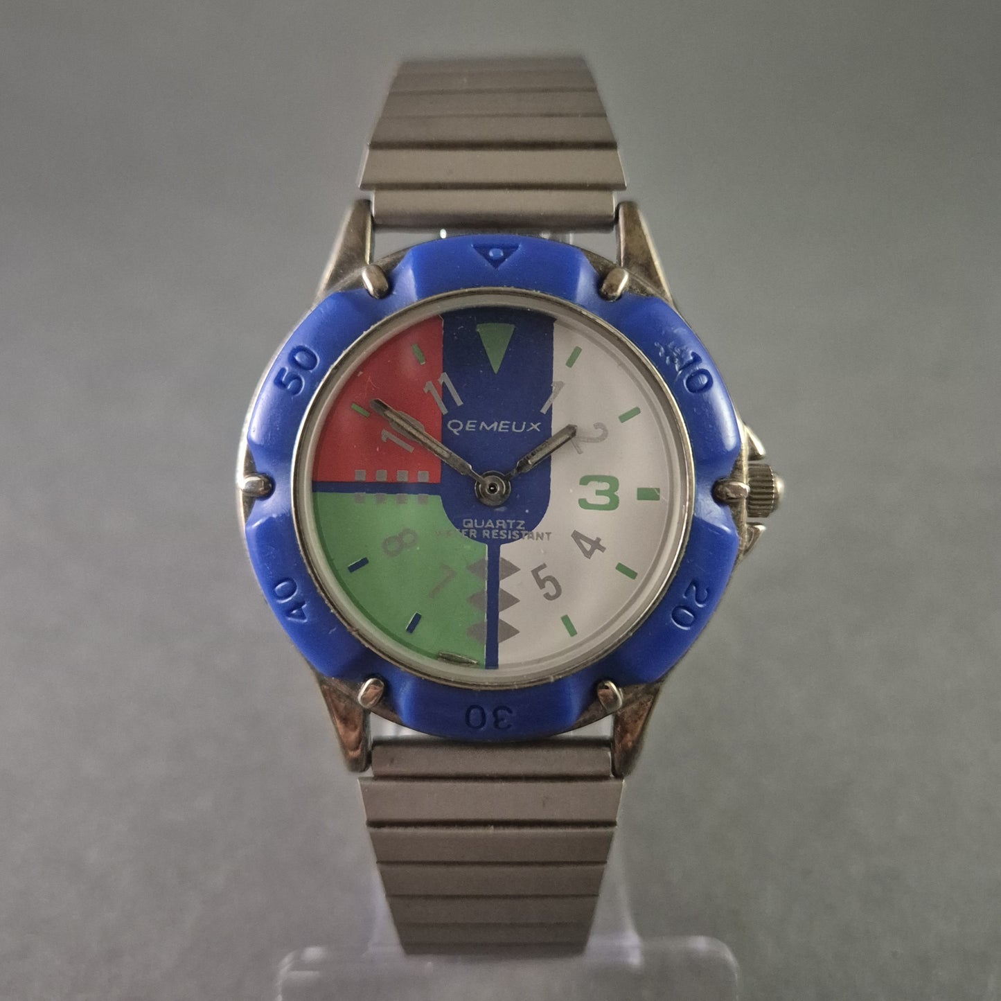 Seltene Qemeux Herrenarmbanduhr – Buntes Design mit Edelstahlarmband