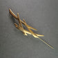 Elegante goldene Designer-Brosche – Modernes, geometrisches Design