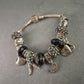 Elegantes Charm-Armband in Silber & Schwarz – Funkelnde Akzente mit Anhängern