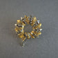 Vintage-Brosche im Kranzdesign – Gold-Silber-Kombination mit Strukturdetails
