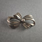 Vintage-Schleifenbrosche aus 835er Silber – Klassische Eleganz