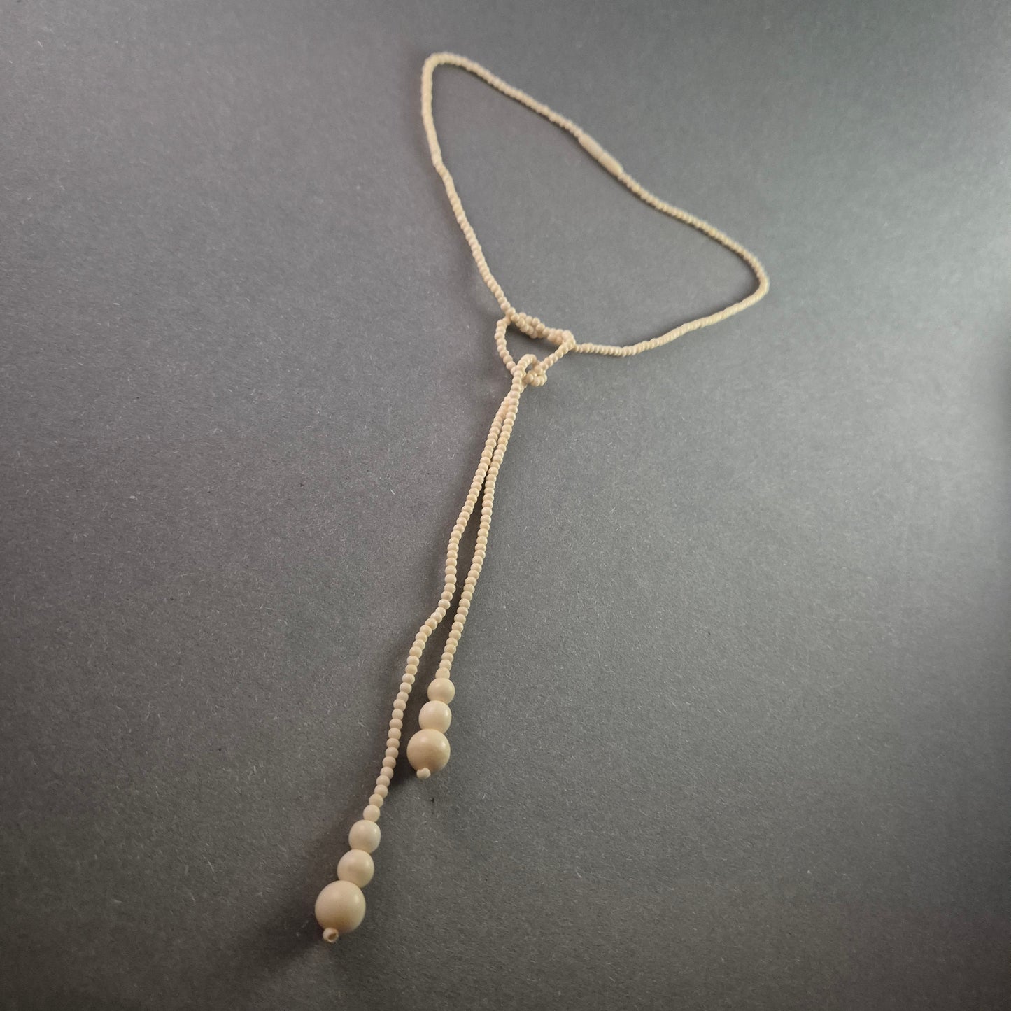 Elegante Vintage-Knotenkette in Elfenbeinoptik – Zeitlose Raffinesse