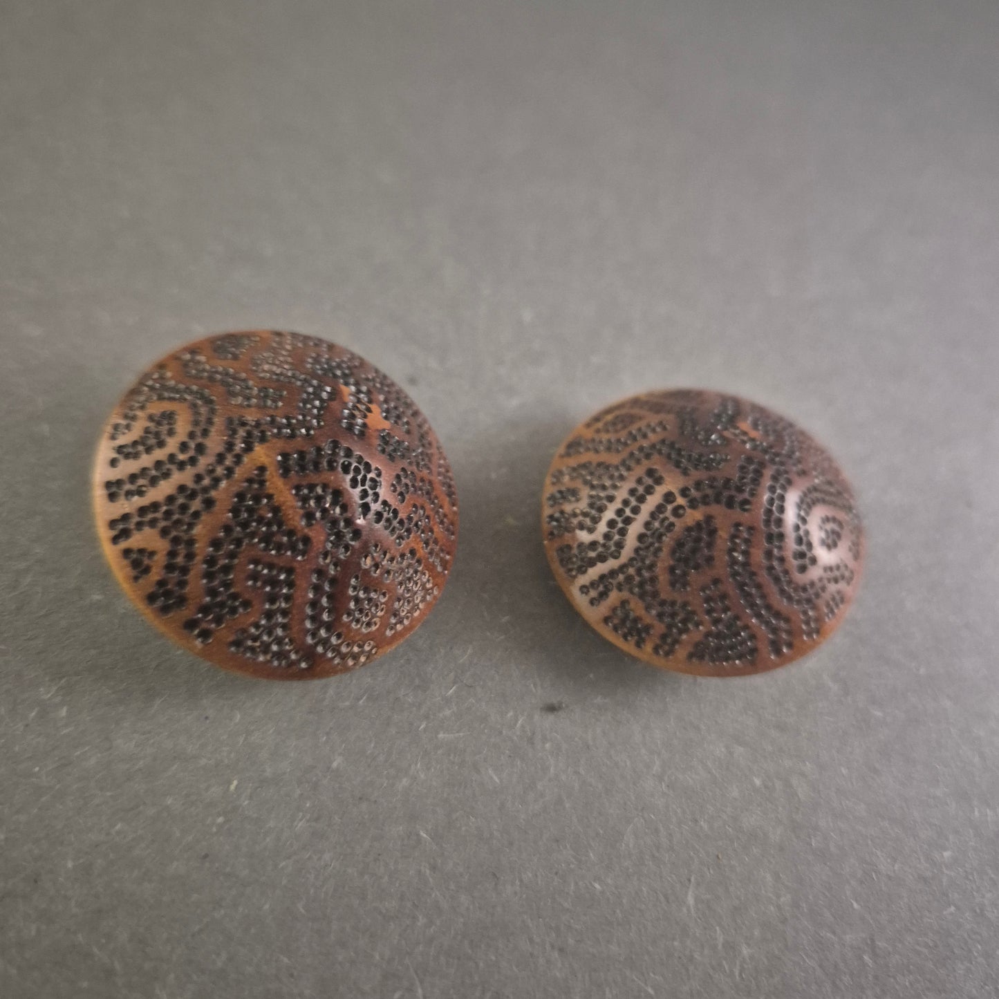 Manschettenknöpfe mit kunstvoller Gravur