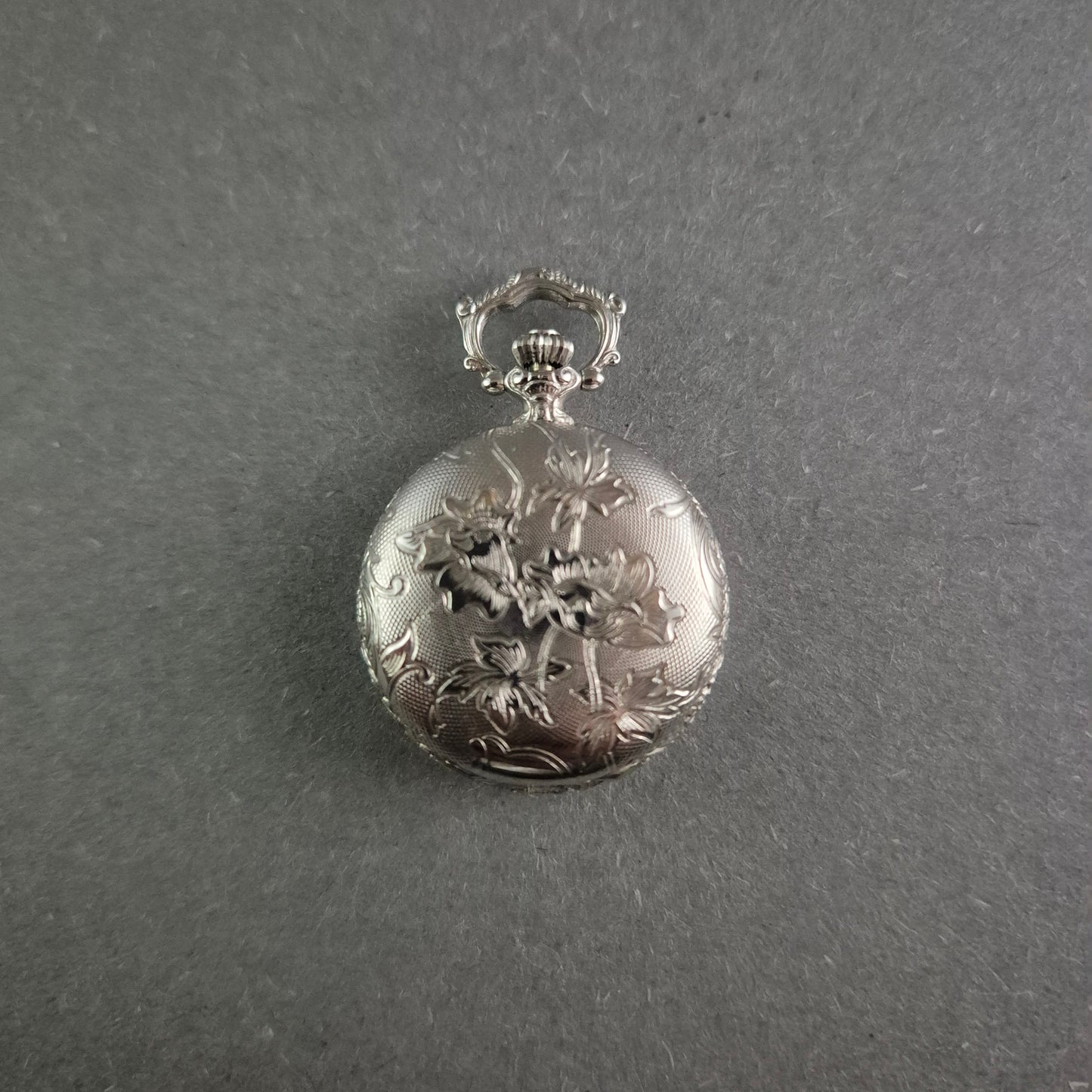 Elegante Sinn Taschenuhr – Florale Gravur im klassischen Design