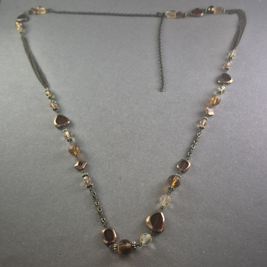 Elegante Vintage-Glasperlenkette in warmen Bernstein- und Bronzetönen