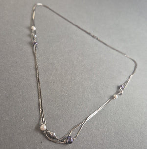 Elegante Vintage-Perlenkette mit Silberakzenten – Zeitlose Raffinesse