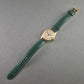 Vintage EMES Armbanduhr – Klassisches Design mit grünem Lederarmband
