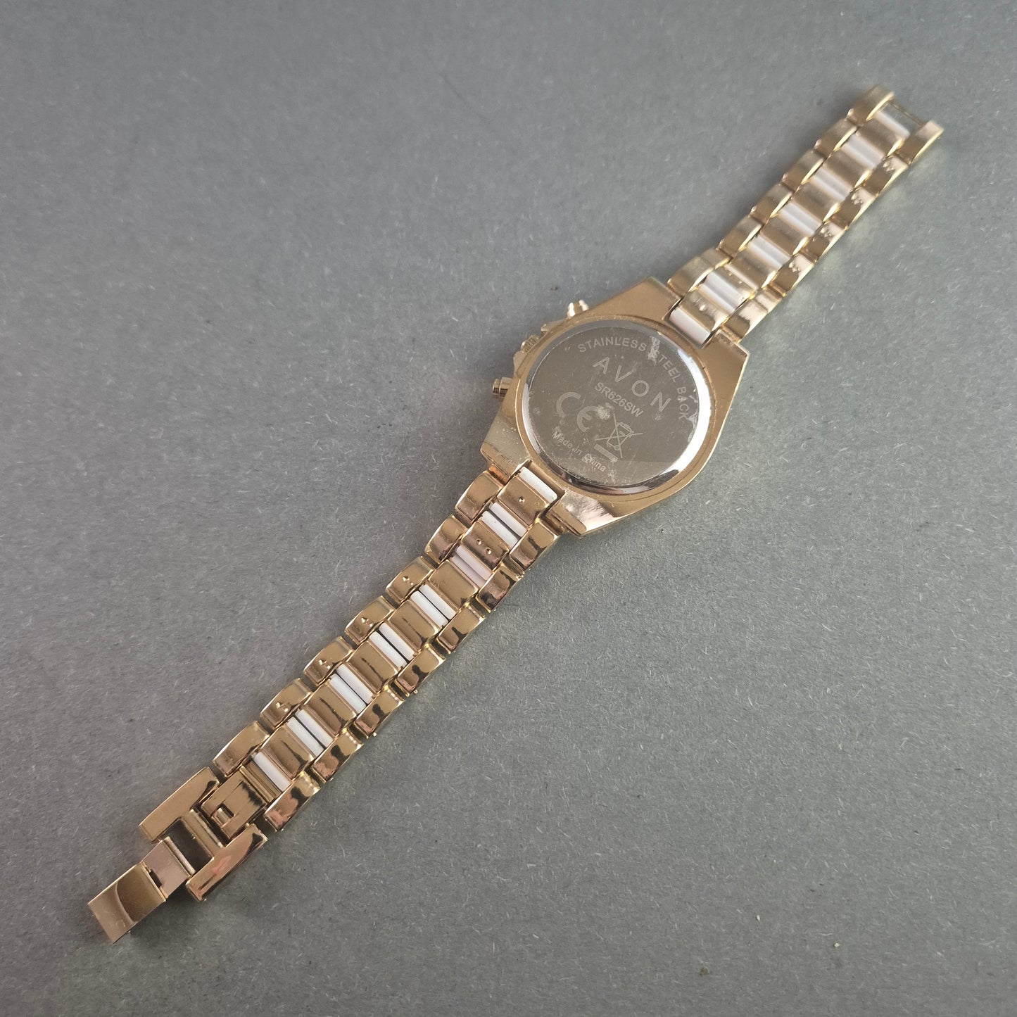 Stilvolle Avon armbanduhr – Goldenes Design mit Chronographen-Look