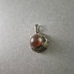 Antiker Silberanhänger mit rundem Bernstein – Eleganter Vintage-Schmuck