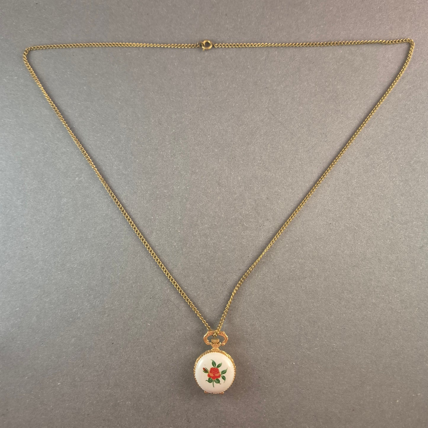 Antike Halsketten-Taschenuhr – Vergoldetes Design mit Rosenmotiv