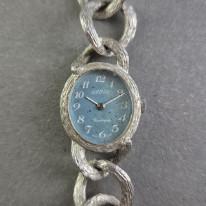 Elegante Roamer Boutique Damenarmbanduhr – Vintage-Stil mit kunstvollem Armband