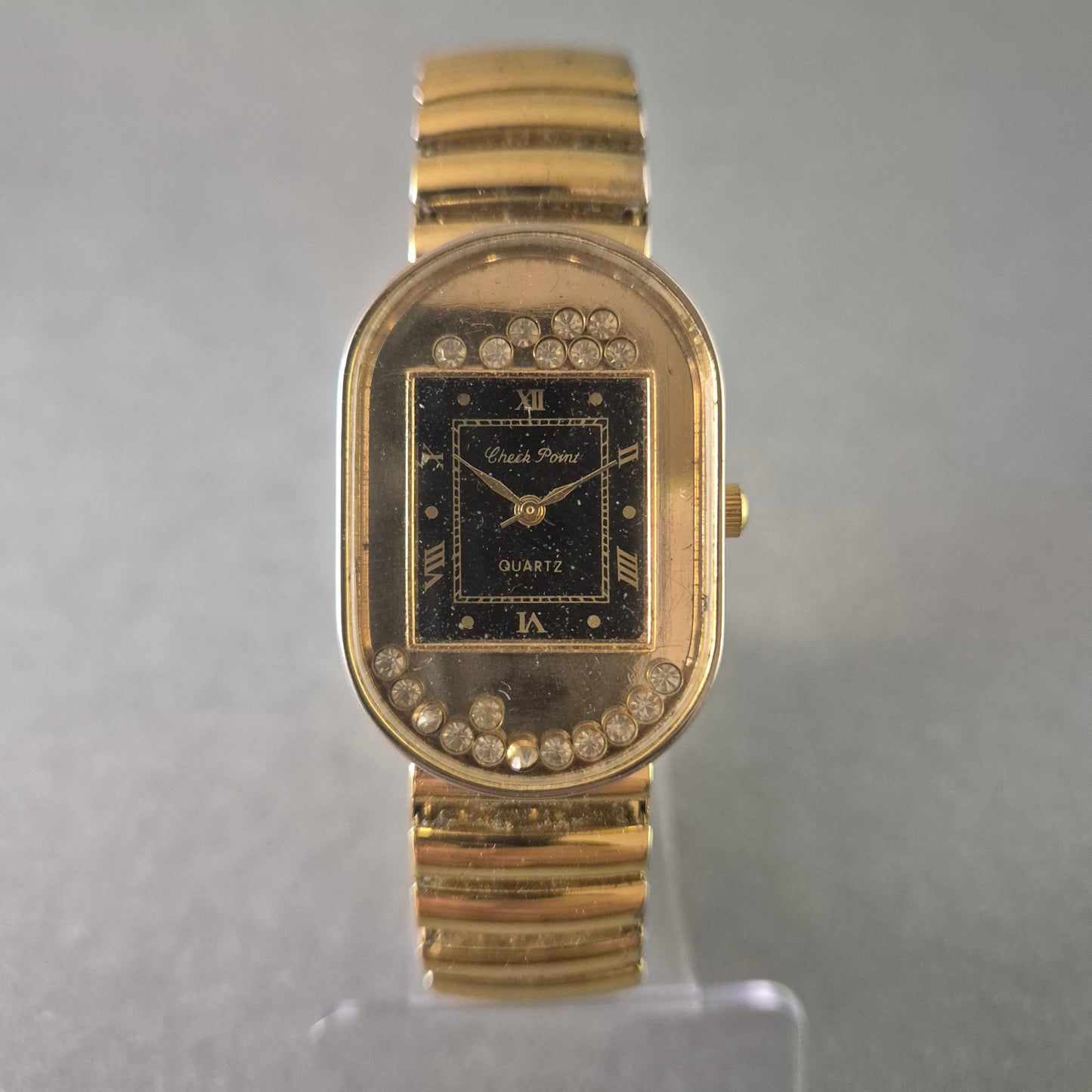 Elegante Check Point Damenarmbanduhr – Goldfarben mit funkelnden Steinen
