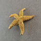 Goldene Seestern-Brosche – Maritimer Vintage-Chic