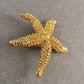 Goldene Seestern-Brosche – Maritimer Vintage-Chic