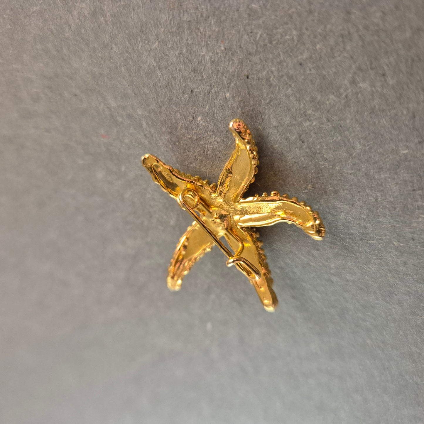 Goldene Seestern-Brosche – Maritimer Vintage-Chic