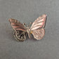 Vintage Schmetterlingsbrosche – Verspieltes Design in Silberoptik