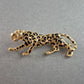 Elegante Panther-Brosche – Goldfarbener Look mit schwarzem Muster