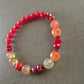 Elastisches Edelstein-Armband in Rot- und Orangetönen – Boho-Style