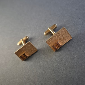 Manschettenknöpfe in Goldoptik mit „H“-Monogramm