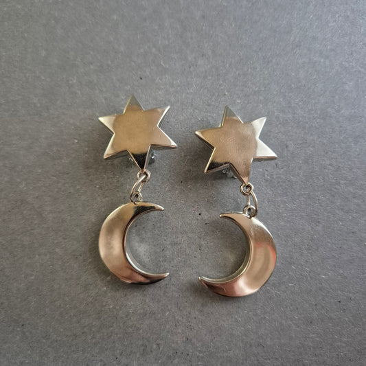 Silberfarbene Clip-Ohrringe mit Stern-Mond-Motiv im Retro-Stil