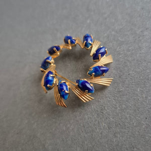 Vintage-Brosche mit blauen Steinen – Eleganz im Retro-Stil