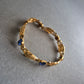 Vergoldetes Vintage-Armband mit blauen Steinen – Elegant und filigran